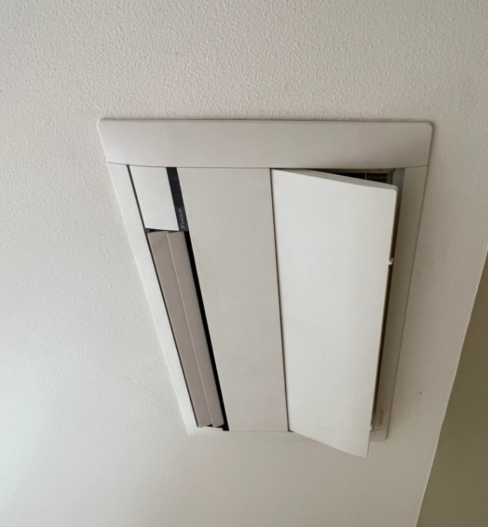 alt text: Ductless mini-split ceiling cassette unit installed in an Olympia, WA home
